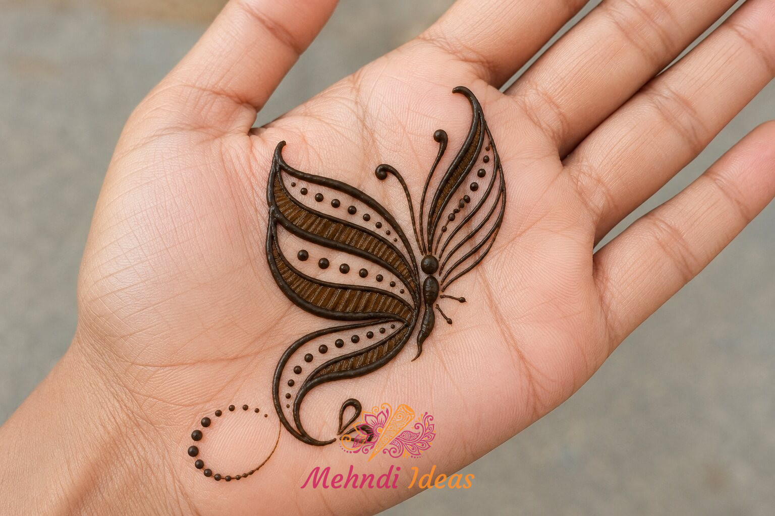 Stylish Butterfly Mehndi Design with asymmetric wings on front hand
