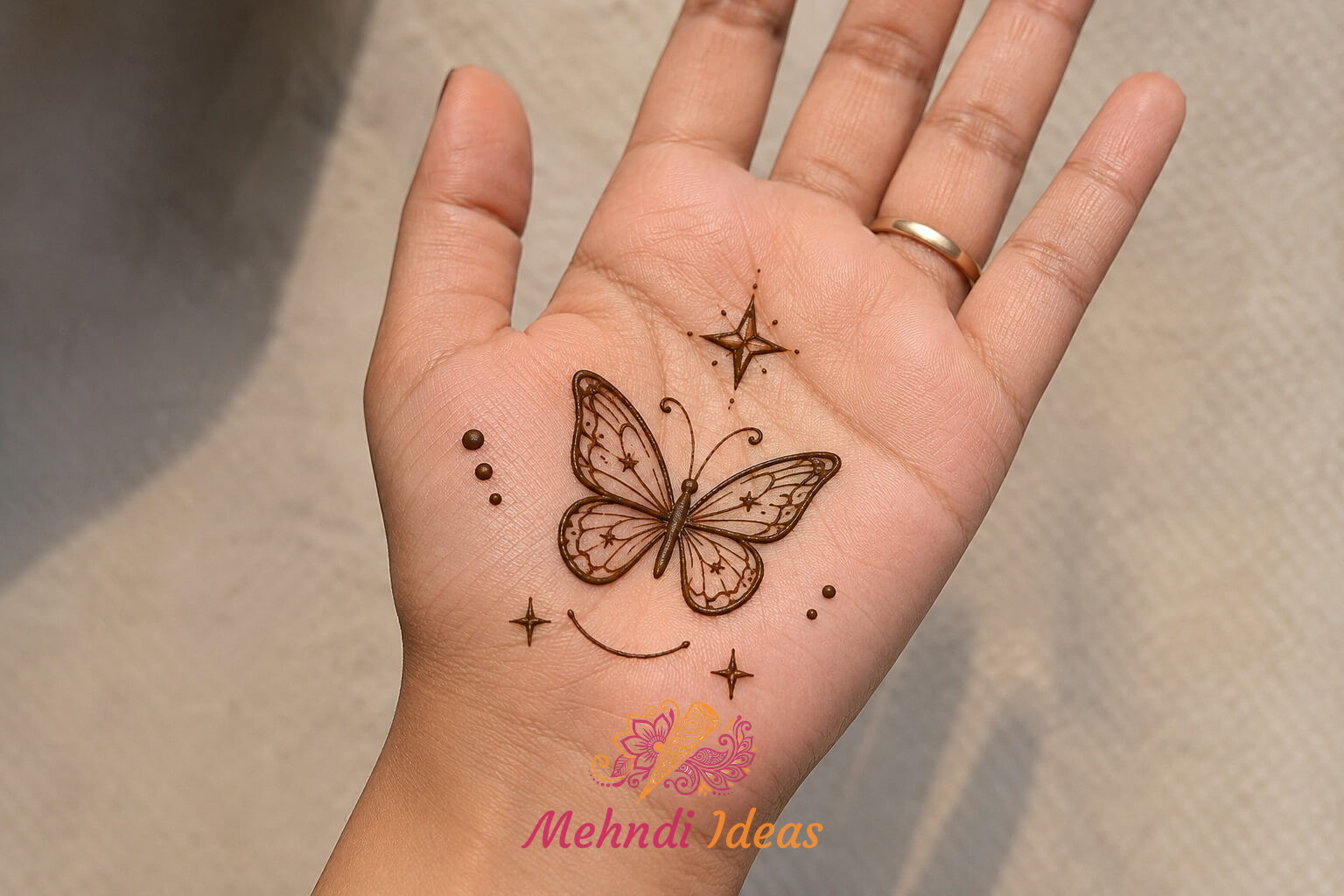 Stylish Butterfly Mehndi Design with tiny stars on front hand