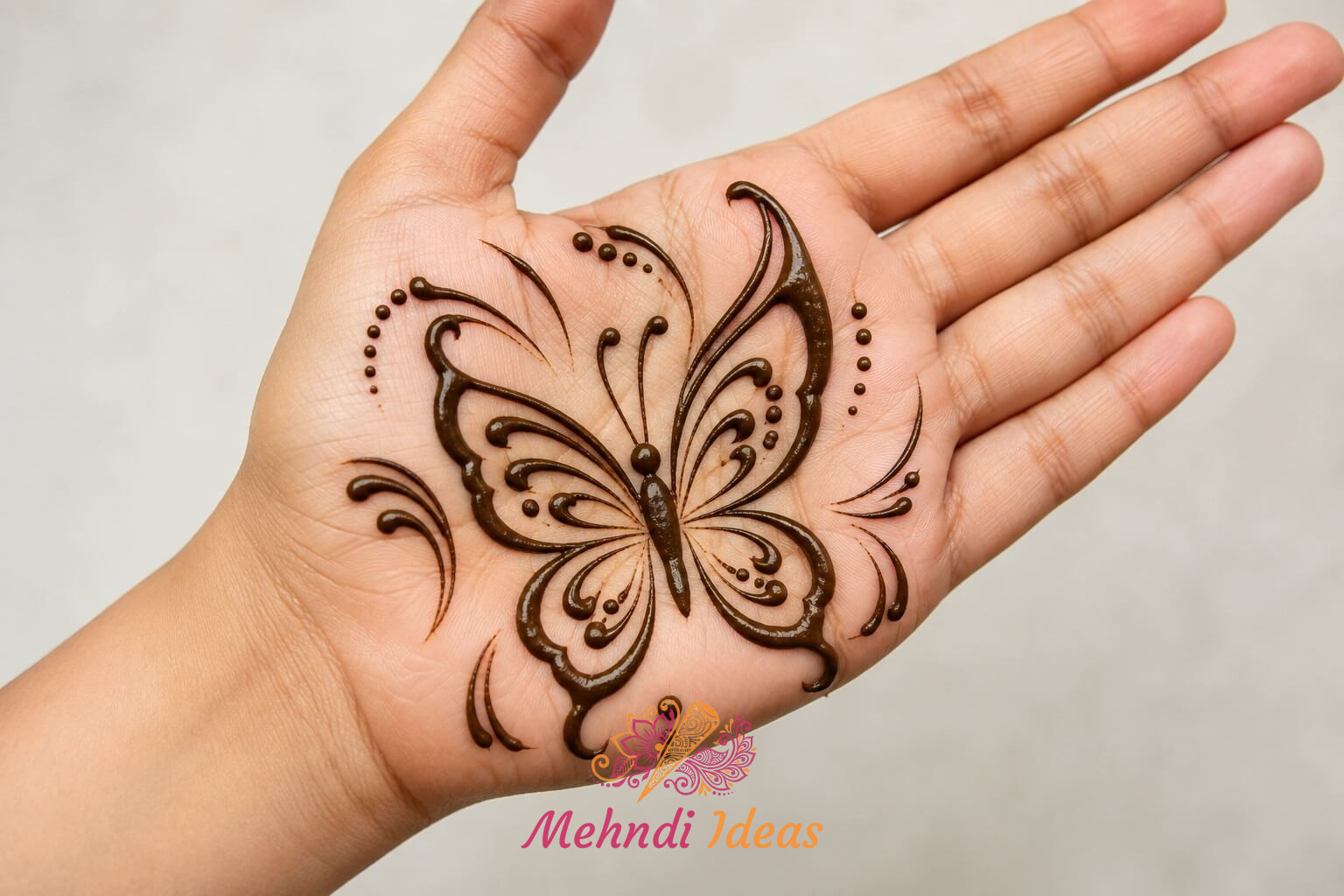 Beautiful Butterfly Mehndi Design with delicate dotted halo