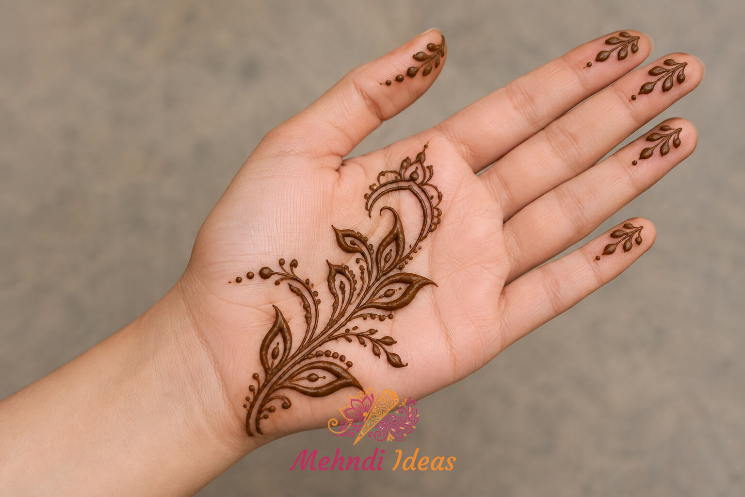 Arabic Henna Design with open angular leaf trail on front hand