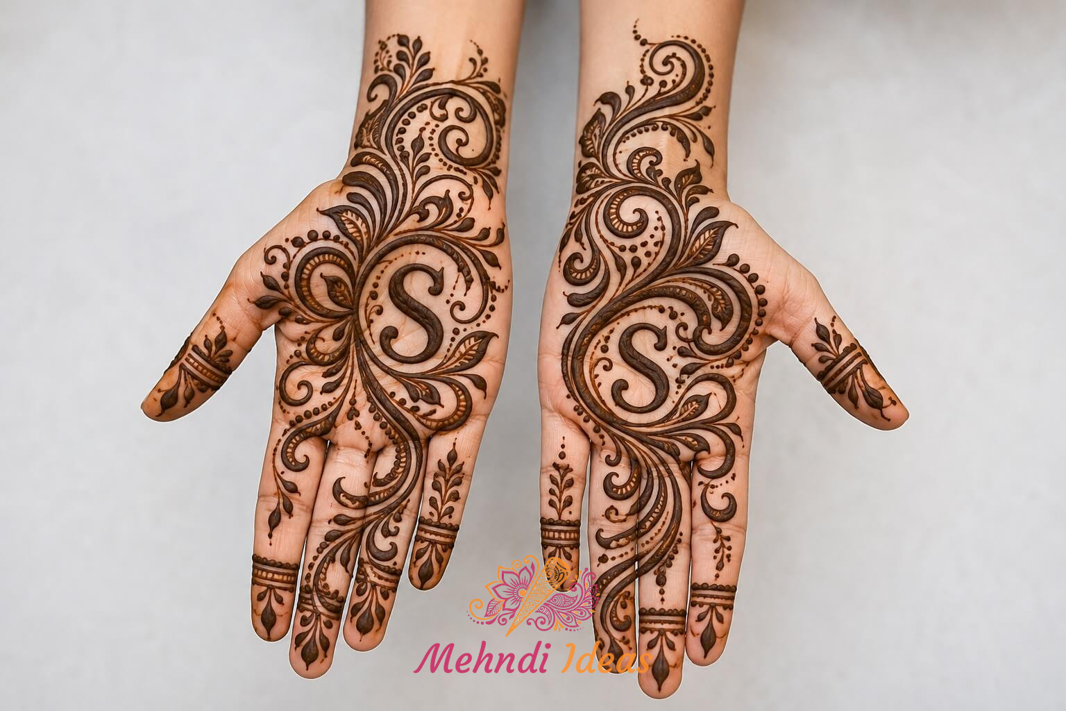 S Letter Mehndi Designs में कलाई तक भरी अरबी फ्रंट हैंड मेहंदी