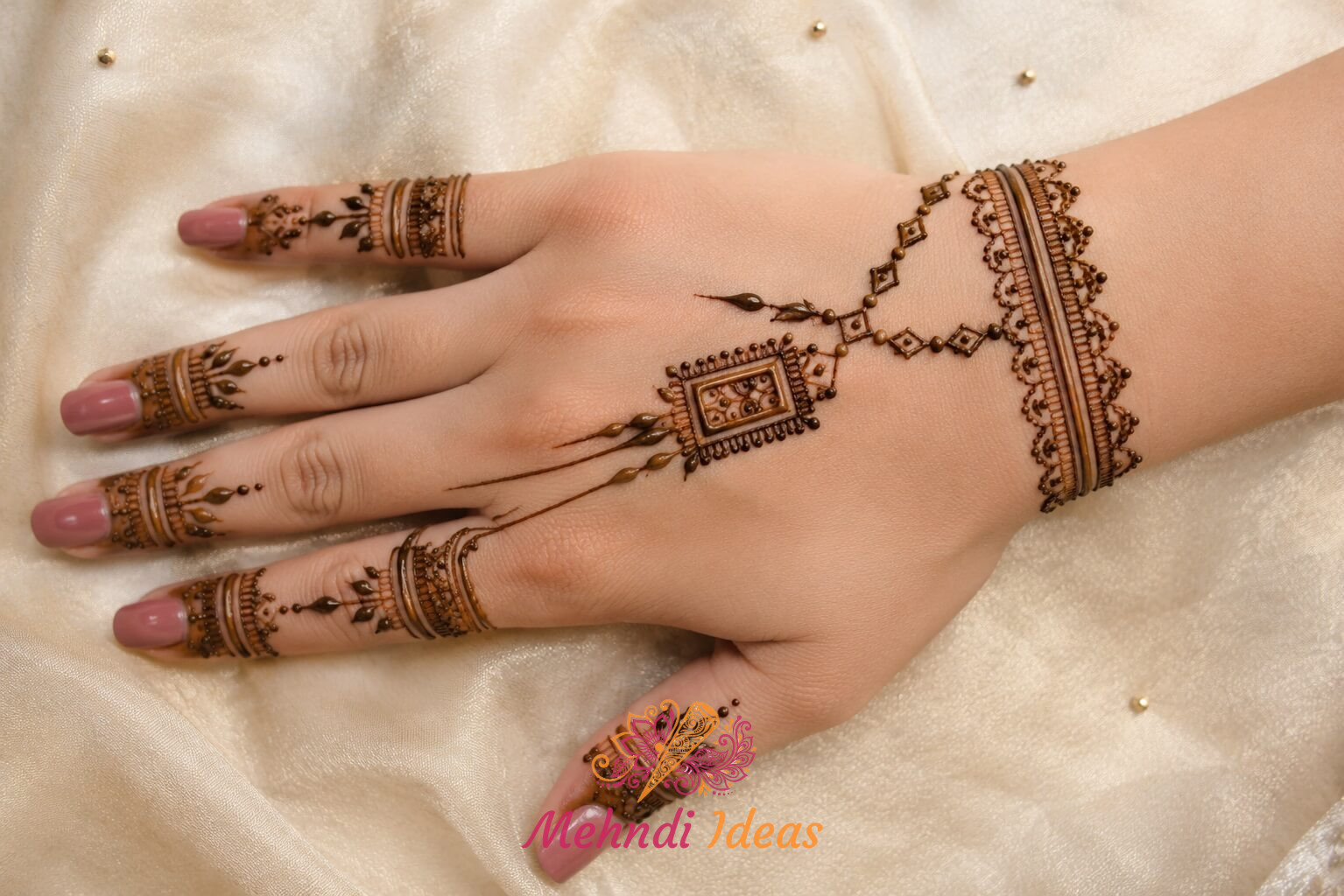 Arabic Henna Design with rich ornamental arches for wedding back hand