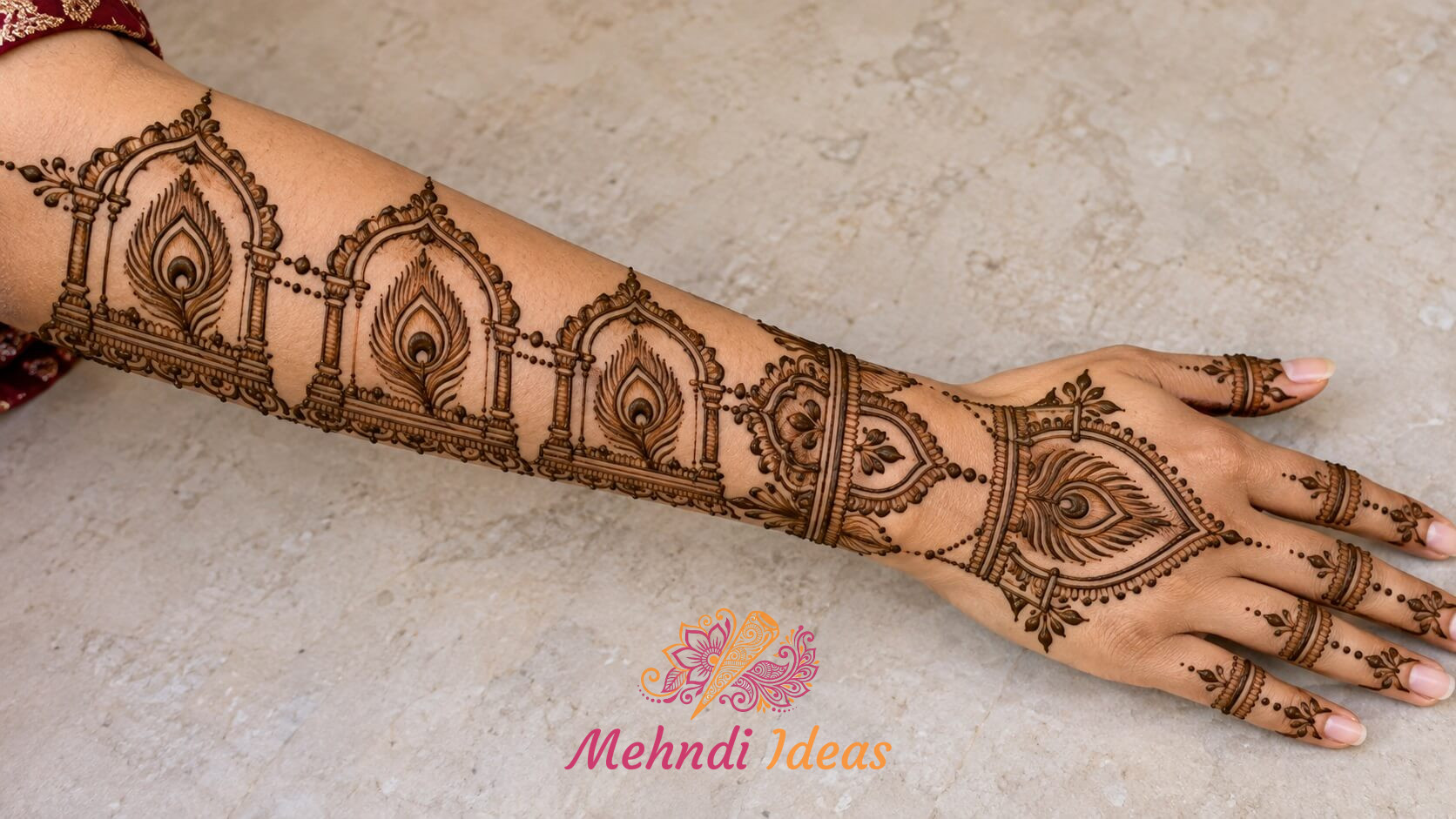 royal back hand mehndi design with feather-eye architecture and ornamental panels